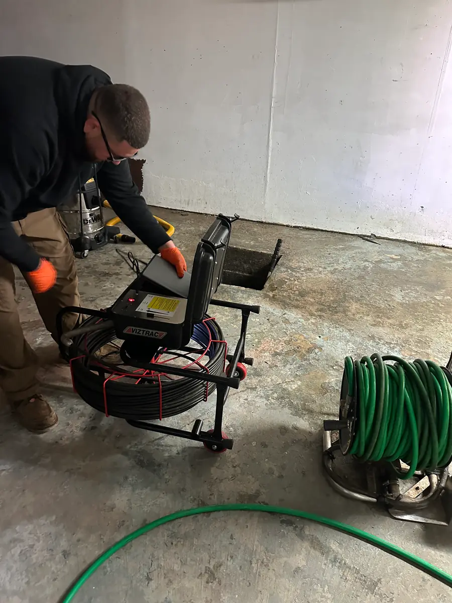 Feeding the inspection camera down a drain line